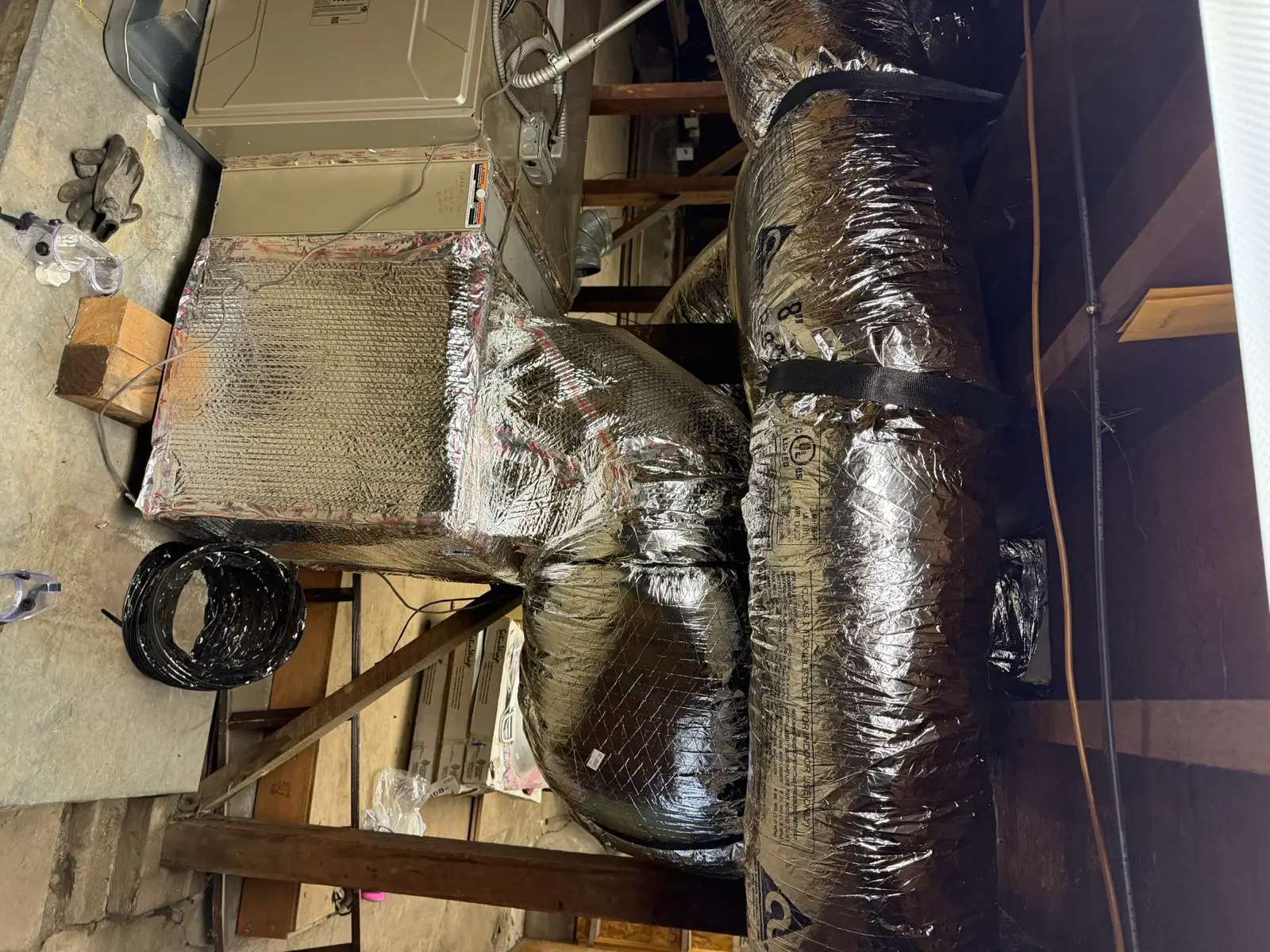Newly run insulated flex duct trunk lines in an attic