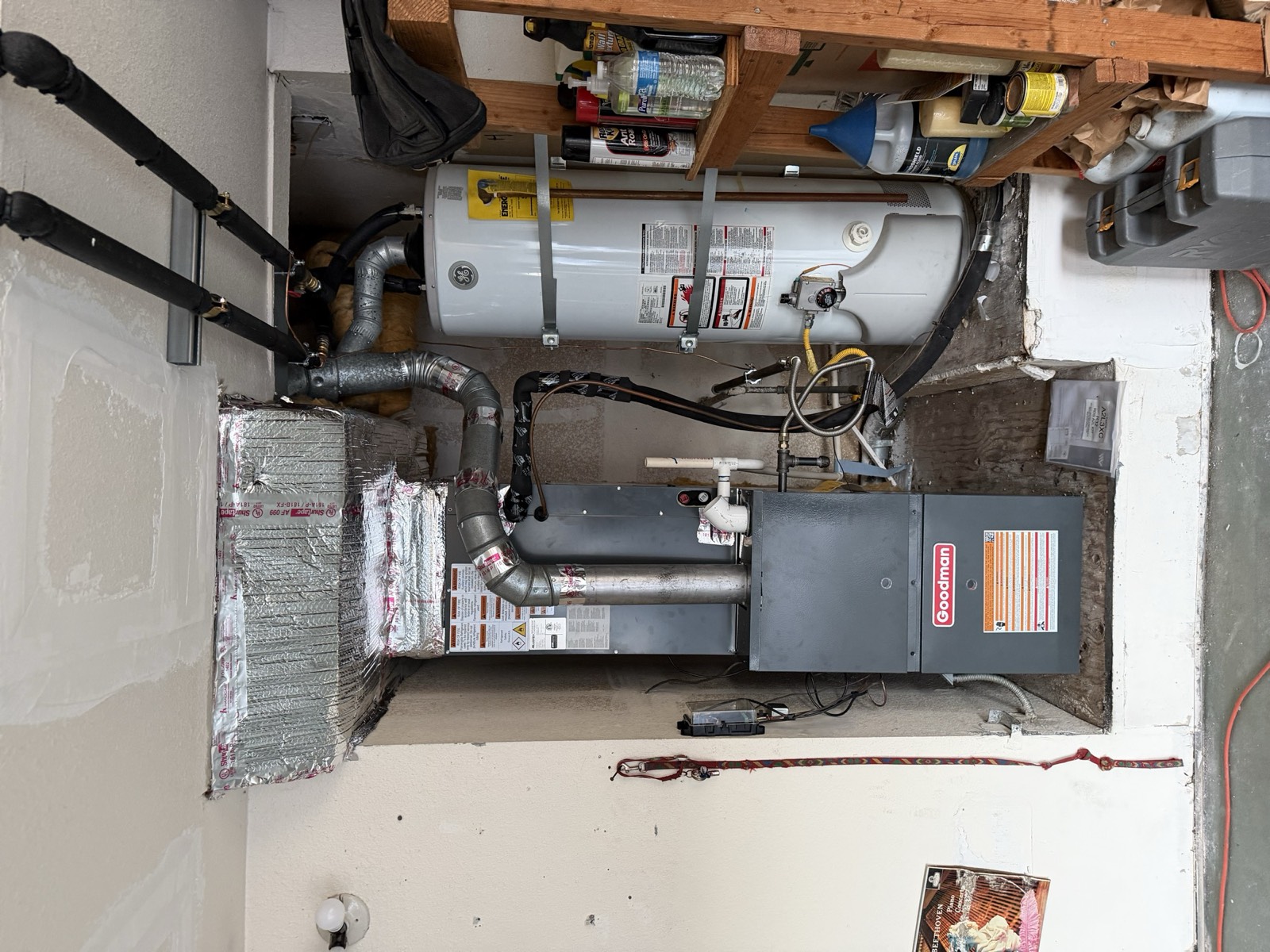 Goodman furnace and water heater installation in a garage utility closet